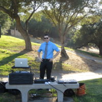 Tev DJing an outside wedding ceremony in Ramona, California