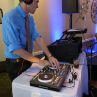 Tev DJing a wedding dance in Ramona, California
